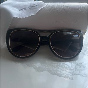 Black and gold women’s fashion sunglasses